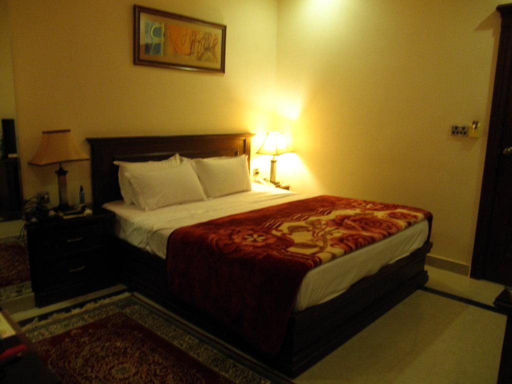 Raj One Hotel